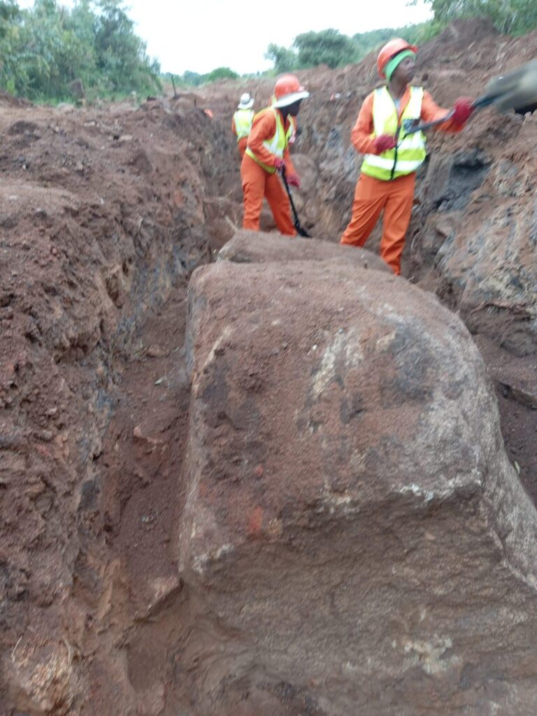 Breaking of boulders in trench with Darda rock Splitter.